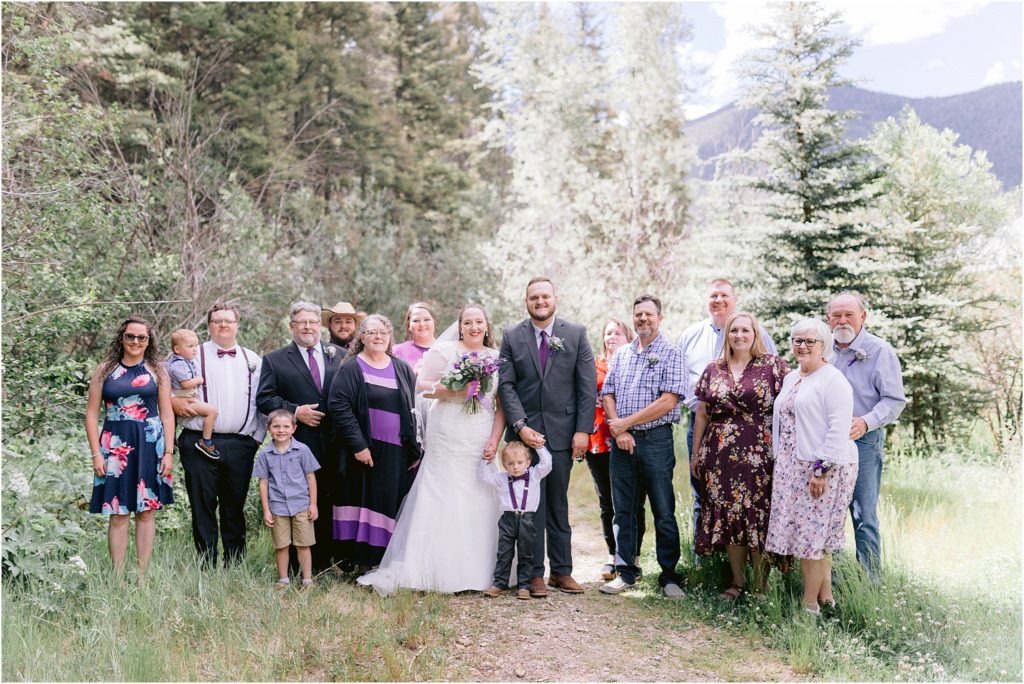 The beautiful wedding party smiles and celebrates together in the great outdoors of New Mexico for their wedding, shot by Albuquerque's favorite photographer Shayla Cristine Photography.