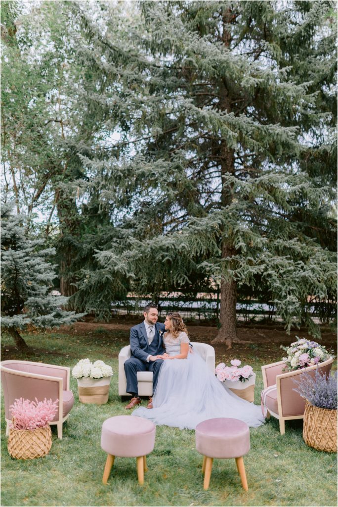 Outdoor wedding shoot furniture layout with a vintage vibe, planned by A Beautiful Theme, and captured by Shayla Cristine Photography at New Mexico outdoor farmhouse historic wedding venue. 