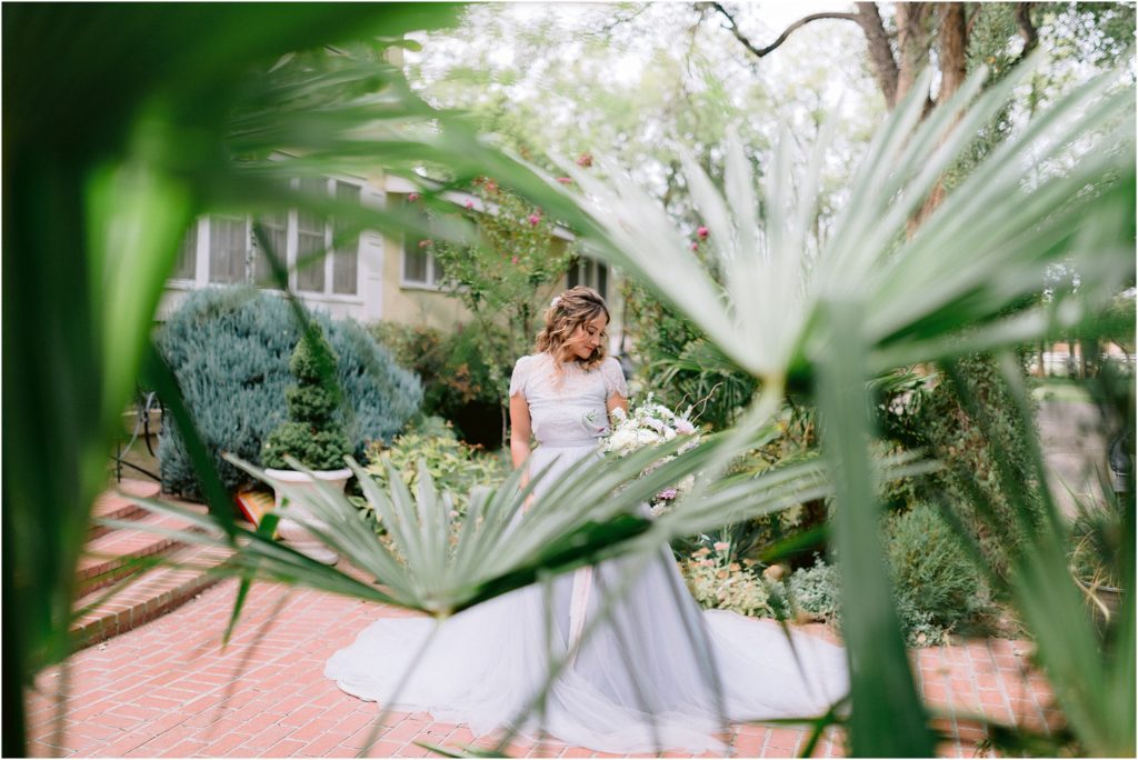 Local wedding photography team captures this bride model in her lilac Alexandra Brecco wedding gown at the outdoor wedding venue in New Mexico, shot by Shayla Cristine Photography.